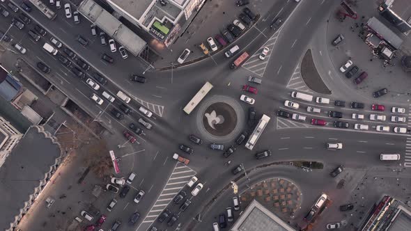 Top Down View of Roundabout Late Evening Overhead Aerial Drone Flight alt