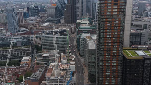 Forwards Ascending Fly Above Business District alt