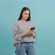 Young Woman Using Smartphone. Girl Texting To Her Boyfriend on Her Phone. - VideoHive Item for Sale