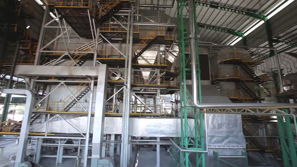 Production machine processing and producing palm oil in a huge factory in Malaysia (Kilang Kelapa Sa alt