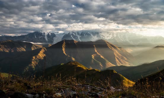 Beautiful Cloudy Sunrise Timelapse in Mountains of Svaneti in Georgia with Tetnuldi Mountain