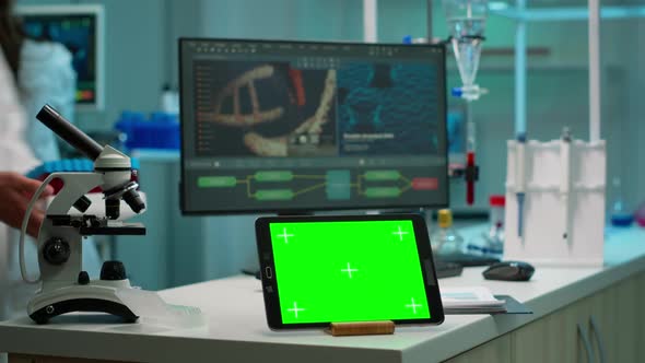 Display Tablet with Green Screen Mock Up on Template Placed on Desk alt