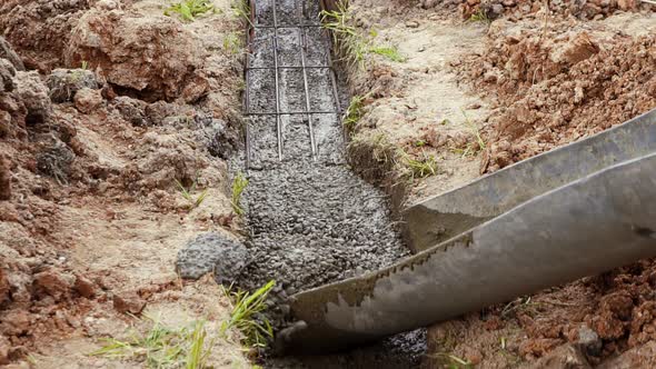 Current Cement Filling the Foundation of a Residential House alt