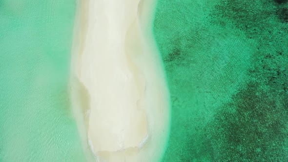 Aerial top down landscape of paradise sea view beach lifestyle by clear lagoon with white sand backg alt