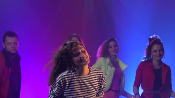 Friends Dancing at a Party Having a Night alt