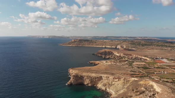 Aerial drone video from northern Malta near the Ghajn Znuber Tower. alt