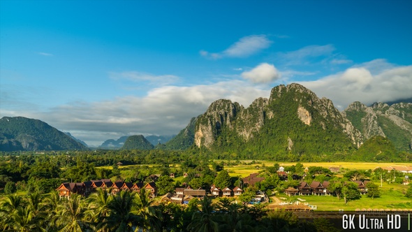 6K Time-Lapse of the Scenic Limestone Cliffs Countryside in Vang Vieng, Laos alt