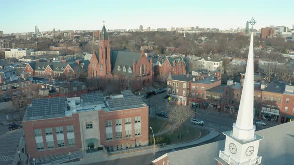 Smooth Aerial Drone Shot of Several Church Steeples in Suburban Boston