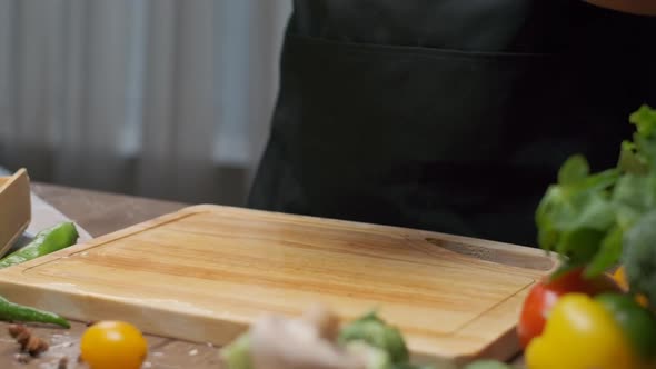 Professional Chef Prepares Red and Green Bell Pepper alt