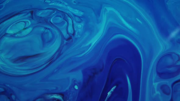 Blue Liquid Painting In Milk And Soap Mixing alt