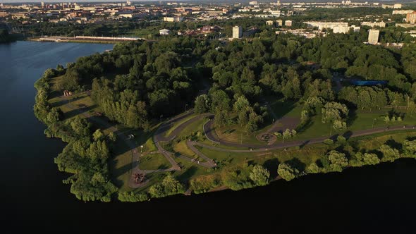 Top View of the City Park and Sports Complex in Chizhovka, Recreation Park with Bike Paths in Minsk alt