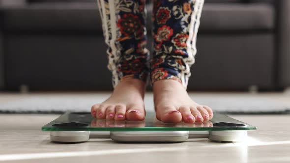 Girl Barefoot Measuring Body Fat Overweight