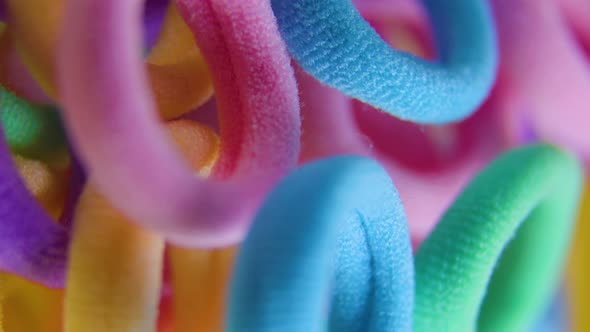 Vertical View of a Vivid Colors Rotating Close Up Textile Rubber Bands alt