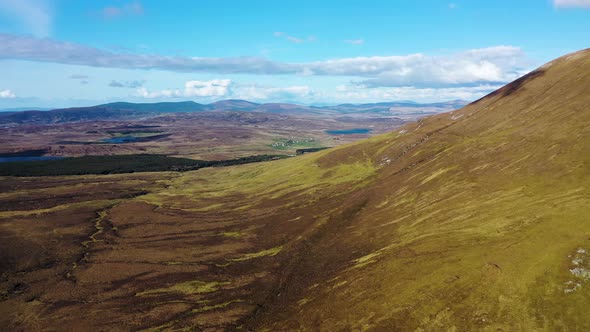 Aerial View of the Beautiful Coast at Malin Beg with Slieve League in the Background in County alt