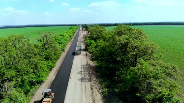 Aerial View on the New Asphalt Road Road Repair alt