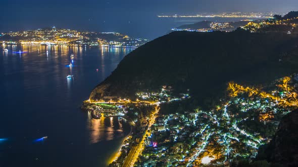 Night Timelapse View of the Mediterranean Coastline of the Town of Eze Village on the French Riviera alt