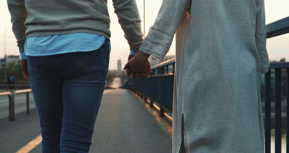 Couple in Love Holding Hands and Traveling Together
