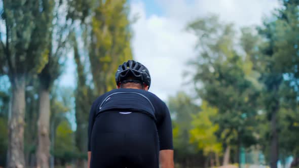 Cyclist Fitness Riding On Road Bike Ready For Triathlon Race. Recreation Sport. Hard Sport Workout. alt