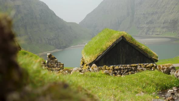 Old Faroese House with Grass Rooftop in the Middle of Mist Nature alt