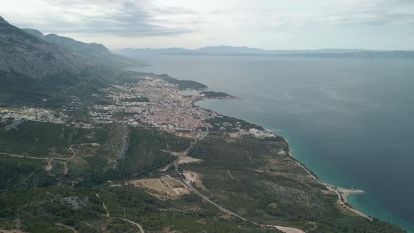 Drone View of a Mountain Road in the Makarska Riviera Region in Croatia with Stunning Adriatic