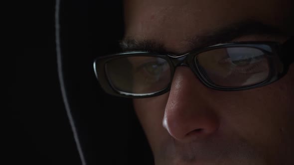 Head shot of man working on computer alt