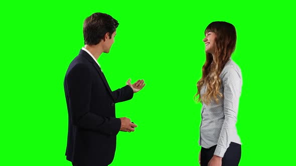 Caucasian man giving car keys to the lessor with green screen alt