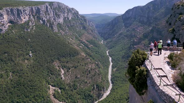 Tourists on the viewpoint at Verdon Gorge (Gorges du Verdon) in Provence, France alt