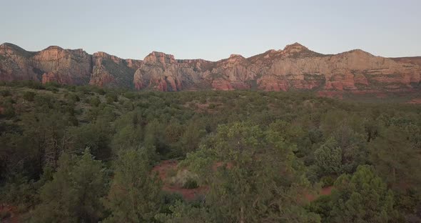 Drone shot of beautiful Sedona landscapes during a clear and bright morning alt