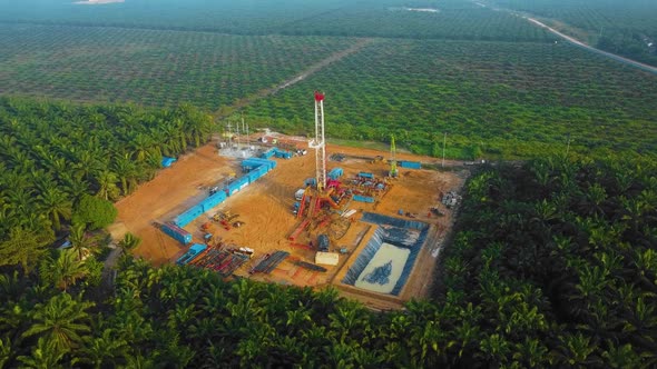 Cinematic Drone Shot of Onshore Drilling and Workover Rig structure and Rig equipment for oil explor alt