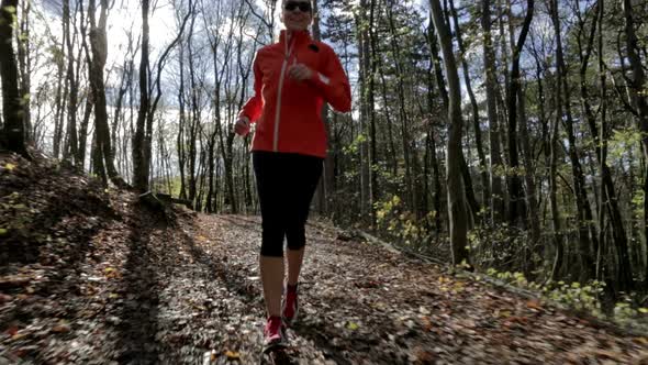Woman Jogging in Wood alt