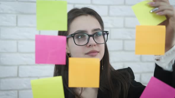 Smart girl with stickers.  alt