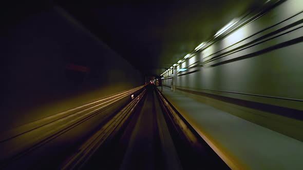Automatic Train going through Subway Metro Underground Tube Tunnel Fast Speed Time Lapse alt