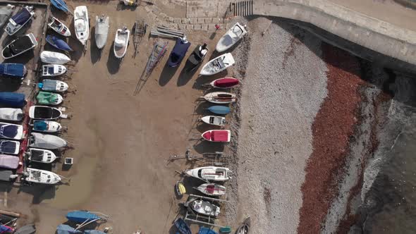 Overhead Aerial View Boats In English South Coast Harbour Lyme Regis;