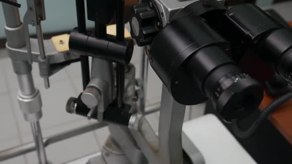 Biomicroscope or A slit lamp is a microscope with a bright light used during an eye exam alt