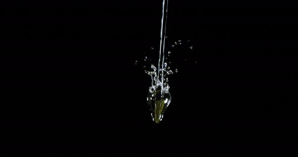 Water Exploding and Splashing against Black Background, Slow motion 4K alt