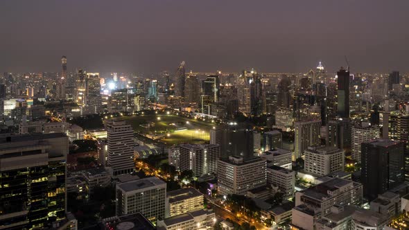 Bangkok business shopping district city center, day to night, zoom in – Time Lapse