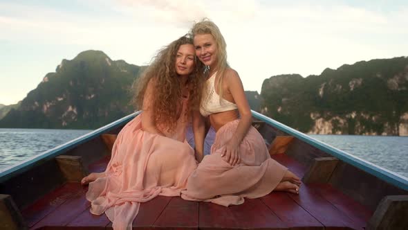 Picturesque Moment with Two Girls on a Boat alt