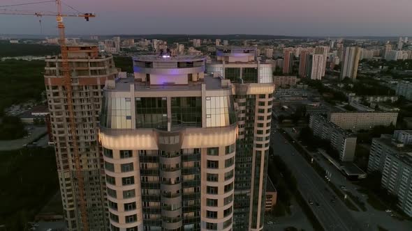 Aerial View of Skyscrapers in evening city at sunset 27 alt