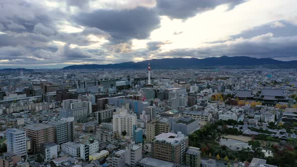 Aerial view 4k video by drone of Kyoto tower and buildings with skyline view alt