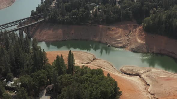 Aerial view of Shasta Lake straight down in Northern California low water levels during drought alt