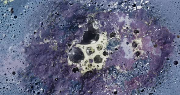 Blue and Purple Paint Bubbling and Spewing