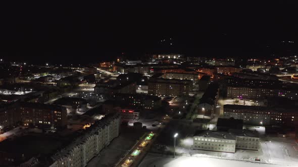 Aerial View of the Night Landscape of the City in the Arctic in the Arctic Circle in Winter