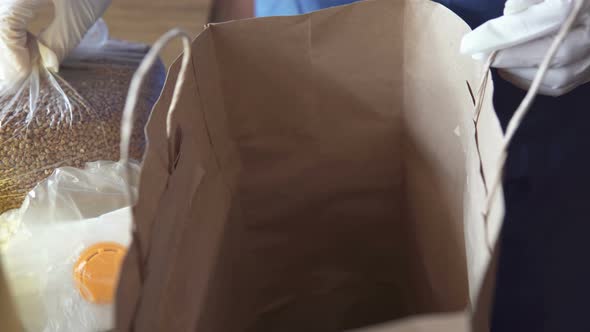 Food packaging and delivery for low-income families in self-isolation alt