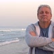 Sporty Retired Man with Arms Crossed Portrait on the Beach - VideoHive Item for Sale