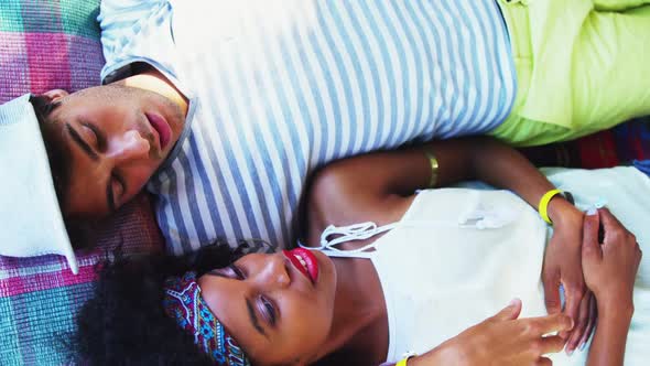 Couple relaxing in tent 4k alt