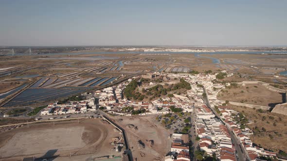 Aerial view of Castro Marim salt pans and Guadiana River, Algarve, Portugal alt