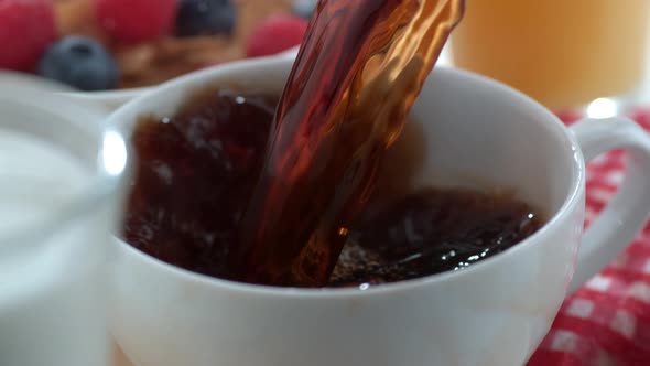 Coffee pouring in slow motion; shot on Phantom Flex 4K at 1000 fps alt
