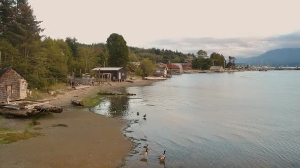 Drone shot of small fishing village alt