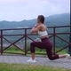 Athletic Girl Working Out in the Mountains - VideoHive Item for Sale