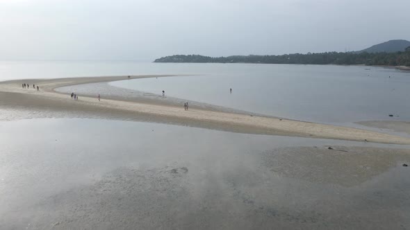 Fly Over People Raking Clams On The Sandbanks In Koh Phangan Thailand alt
